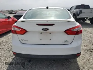 2013 Ford Focus SE z VIN 1FADP3F29DL374088, wystawiony jako Copart lot #59585135 z przebiegiem 74 997 mil mil oraz Szkoda całkowita • Salvage title. Historia ofert i sprzedaży dostępna na DreamBid. Obrazek 6.