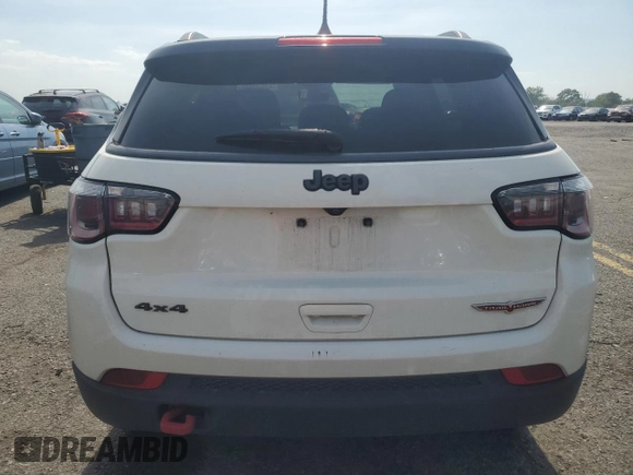 2019 Jeep Compass Trailhawk with VIN 3C4NJDDB5KT647778, listed as a Copart auction lot 62032515 with 51,505 mi miles and Salvage title. Bid and sale history available at DreamBid. Image 6.