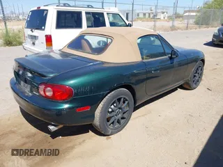 2001 Mazda MX-5 Miata with VIN JM1NB353410202216, listed as a IAAI auction lot 42126191 with Not Provided miles and . Bid and sale history available at DreamBid. Image 4.