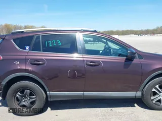 2016 Toyota RAV4 LE with VIN 2T3ZFREV4GW284902, listed as a IAAI auction lot 42054633 with 117,463 mi miles and . Bid and sale history available at carsss.com. Image 14.