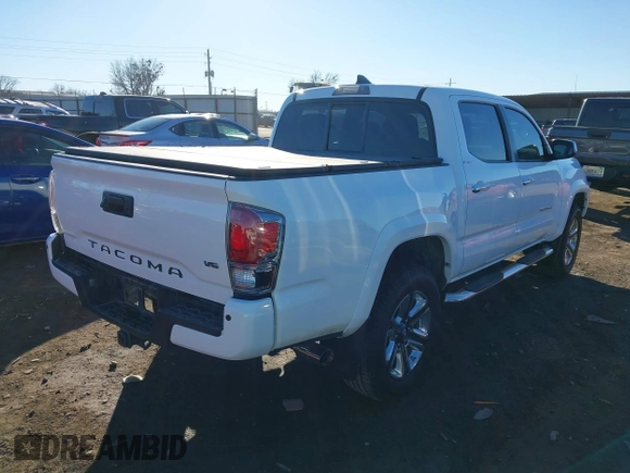 2016 Toyota Tacoma Limited with VIN 5TFEZ5CN4GX009513, listed as a IAAI auction lot 41363058 with 108,382 mi miles and . Bid and sale history available at DreamBid. Image 4.