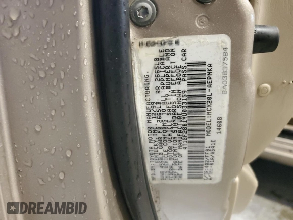 2000 Toyota Avalon XL with VIN 4T1BF28B1YU033159, listed as a Copart auction lot 52796755 with 247,062 mi miles and Salvage Title. Bid and sale history available at DreamBid. Image 14.