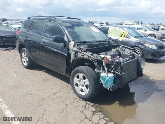 2011 Toyota RAV4 with VIN JTMZF4DVXB5033077, listed as a IAAI auction lot 41885636 with 137,642 mi miles. Bid and sale history available at carsss.com. Image 1.