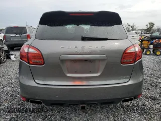 2011 Porsche Cayenne S with VIN WP1AB2A2XBLA55565, listed as a Copart auction lot 63094305 with 105,250 mi miles and Salvage title. Bid and sale history available at DreamBid. Image 6.