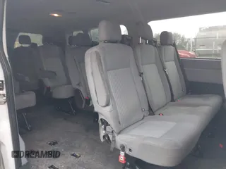 2015 Ford Transit XL with VIN 1FBZX2YM6FKA80301, listed as a IAAI auction lot 41549441 with 310,164 mi miles and . Bid and sale history available at DreamBid. Image 8.