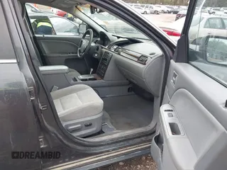 2007 Ford Five Hundred SEL z VIN 1FAHP27157G152811, wystawiony jako IAAI lot #41843996 z przebiegiem Nie podano mil oraz . Historia ofert i sprzedaży dostępna na DreamBid. Obrazek 5.