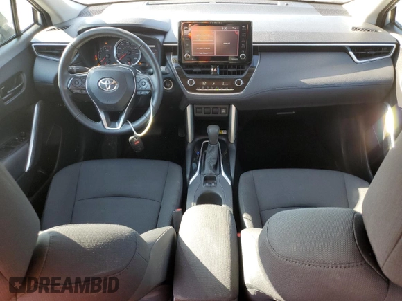2022 Toyota Corolla Cross LE with VIN 7MUCAAAG0NV010646, listed as a Copart auction lot 72151744 with 59,273 mi miles and Salvage title. Bid and sale history available at DreamBid. Image 8.