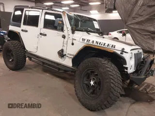 2017 Jeep Wrangler Unlimited Sport with VIN 1C4BJWDG9HL565213, listed as a IAAI auction lot 40999452 with 50,586 mi miles. Bid and sale history available at carsss.com. Image 1.