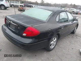 2000 Ford Taurus SE with VIN 1FAFP53U9YA252519, listed as a IAAI auction lot 41247046 with 317,910 mi miles and . Bid and sale history available at DreamBid. Image 4.