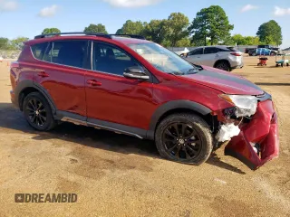 2018 Toyota RAV4 XLE with VIN 2T3RFREV7JW818661, listed as a Copart auction lot 65756615 with 56,369 mi miles and Salvage title. Bid and sale history available at DreamBid. Image 4.