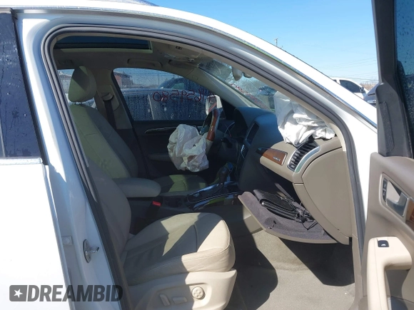 2012 Audi Q5 3.2L Premium Plus with VIN WA1DKAFP0CA012776, listed as a IAAI auction lot 41659580 with 273,447 mi miles. Bid and sale history available at carsss.com. Image 5.