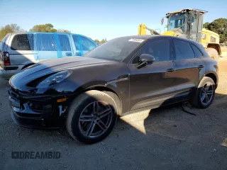 2022 Porsche Macan z VIN WP1AA2A58NLB10516, wystawiony jako Copart lot #77086564 z przebiegiem 26 974 mil mil oraz Czysty tytuł • Clean title. Historia ofert i sprzedaży dostępna na DreamBid. Obrazek 1.