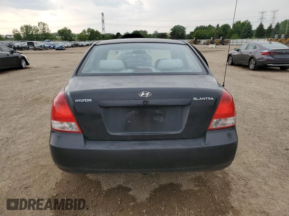 2003 Hyundai Elantra GLS z VIN KMHDN45D63U594320, wystawiony jako Copart lot #58742565 z przebiegiem 163 772 mil mil oraz Szkoda całkowita • Salvage title. Historia ofert i sprzedaży dostępna na DreamBid. Obrazek 6.