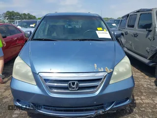 2006 Honda Odyssey EX z VIN 5FNRL38476B120251, wystawiony jako IAAI lot #42128586 z przebiegiem 171 372 mil mil oraz . Historia ofert i sprzedaży dostępna na DreamBid. Obrazek 12.