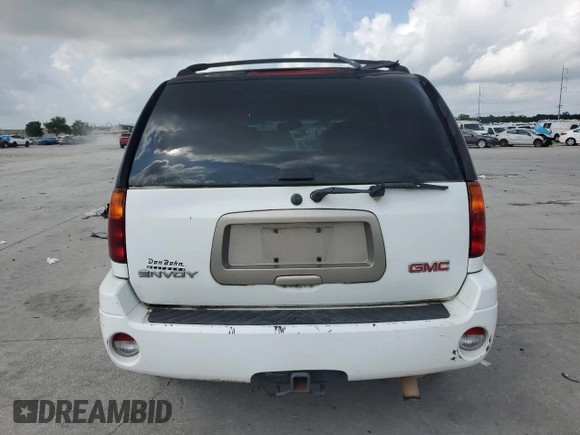2006 GMC Envoy SLE z VIN 1GKDS13S462144683, wystawiony jako Copart lot #58277565 z przebiegiem Nie podano mil oraz Czysty tytuł • Clean title. Historia ofert i sprzedaży dostępna na DreamBid. Obrazek 6.