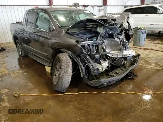 2019 Honda Ridgeline RTL с VIN 5FPYK3F52KB041551, выставлен на аукционе Copart как лот 56640425 с пробегом Не указан миль и Списание • Salvage title. История ставок и продаж доступна на DreamBid. Изображение 14.