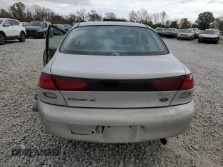 1998 Ford Escort SE with VIN 1FAFP13P6WW182609, listed as a Copart auction lot 77876884 with 165,162 mi miles and Salvage Title. Bid and sale history available at carsss.com. Image 6.