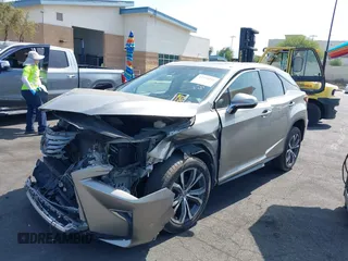 2017 Lexus RX 350 z VIN 2T2ZZMCA3HC041664, wystawiony jako IAAI lot #42379331 z przebiegiem 153 887 mil mil oraz . Historia ofert i sprzedaży dostępna na DreamBid. Obrazek 2.
