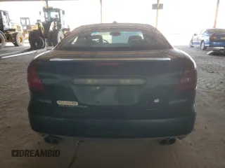2004 Pontiac Grand Prix GTP with VIN 2G2WR524741124701, listed as a Copart auction lot 75262194 with 106,242 mi miles and Salvage Title. Bid and sale history available at carsss.com. Image 6.