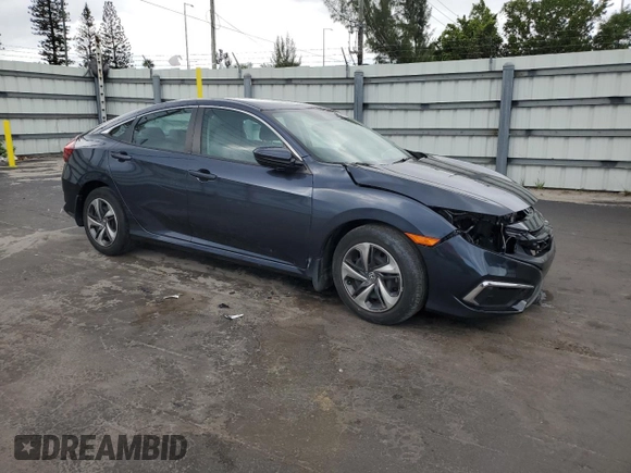 2021 Honda Civic LX z VIN 2HGFC2F69MH502002, wystawiony jako Copart lot #52882605 z przebiegiem Nie podano mil oraz Szkoda całkowita • Salvage title. Historia ofert i sprzedaży dostępna na DreamBid. Obrazek 4.