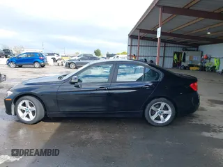 2015 BMW 3 Series 328i with VIN WBA3C1C53FK119723, listed as a IAAI auction lot 41871200 with 112,552 mi miles and . Bid and sale history available at carsss.com. Image 15.