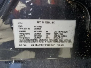 2024 Tesla Model Y Long Range with VIN 7SAYGDEEXRA237667, listed as a Copart auction lot 58260635 with Not provided miles and Salvage title. Bid and sale history available at DreamBid. Image 12.
