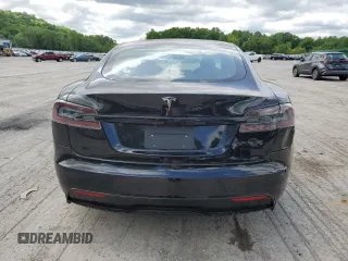 2021 Tesla Model S Long Range z VIN 5YJSA1E52MF428241, wystawiony jako Copart lot #57302035 z przebiegiem 67 775 mil mil oraz Szkoda całkowita • Salvage title. Historia ofert i sprzedaży dostępna na DreamBid. Obrazek 6.