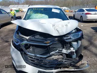 2021 Chevrolet Equinox LT z VIN 2GNAXUEVXM6103006, wystawiony jako IAAI lot #41931128 z przebiegiem 95 390 mil mil oraz . Historia ofert i sprzedaży dostępna na DreamBid. Obrazek 12.