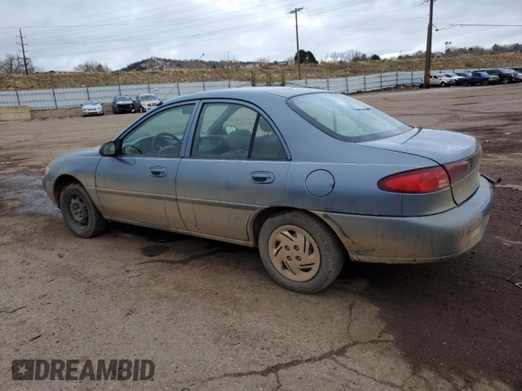 1999 Ford Escort LX z VIN 1FAFP10P6XW217588, wystawiony jako Copart lot #81360454 z przebiegiem 78 977 mil mil oraz Szkody całkowita. Historia ofert i sprzedaży dostępna na DreamBid. Obrazek 2.