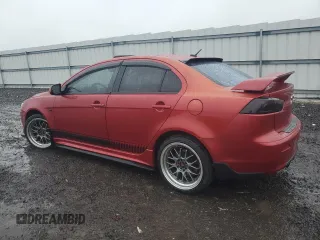 2009 Mitsubishi Lancer GTS with VIN JA3AU86W99U002899, listed as a Copart auction lot 52886455 with 174,184 mi miles and Salvage Title. Bid and sale history available at carsss.com. Image 2.