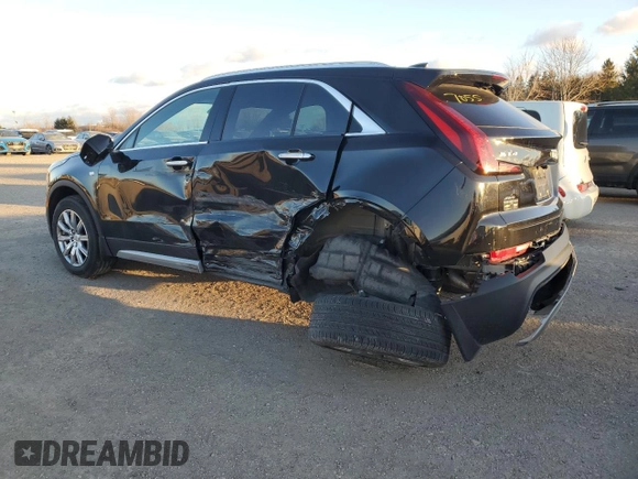 2022 Cadillac XT4 AWD Premium Luxury with VIN 1GYFZDR45NF109999, listed as a Copart auction lot 84618914 with 66,697 mi miles and Clean title. Bid and sale history available at DreamBid. Image 2.