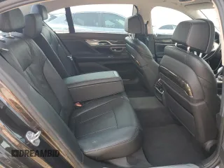 2016 BMW 7 Series 740i z VIN WBA7E2C57GG714564, wystawiony jako Copart lot #56186285 z przebiegiem 111 598 mil mil oraz Szkoda całkowita • Salvage title. Historia ofert i sprzedaży dostępna na DreamBid. Obrazek 10.