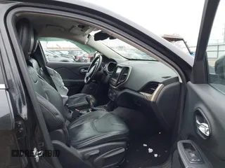 2014 Jeep Cherokee Limited z VIN 1C4PJMDS3EW152969, wystawiony jako IAAI lot #41541632 z przebiegiem 167 706 mil mil oraz . Historia ofert i sprzedaży dostępna na DreamBid. Obrazek 5.