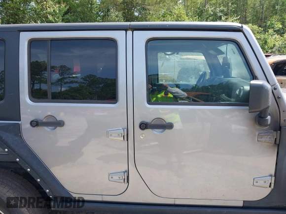 2016 Jeep Wrangler Unlimited Rubicon Hard Rock with VIN 1C4BJWFG6GL265320, listed as a IAAI auction lot 42260151 with Not provided miles and . Bid and sale history available at DreamBid. Image 12.