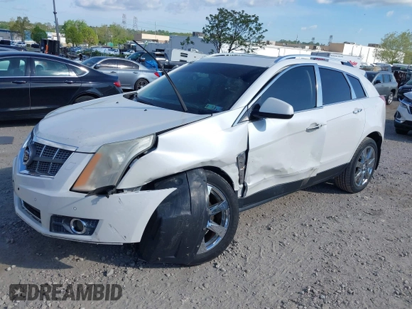 2011 Cadillac SRX Performance Collection z VIN 3GYFNBEYXBS543819, wystawiony jako IAAI lot #42159051 z przebiegiem Nie podano mil oraz . Historia ofert i sprzedaży dostępna na DreamBid. Obrazek 2.