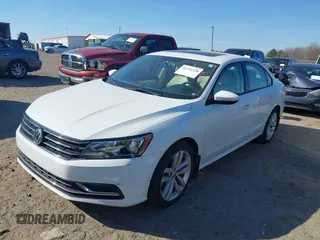 2019 Volkswagen Passat 2.0T Wolfsburg Edition with VIN 1VWLA7A32KC000818, listed as a IAAI auction lot 41711518 with 87,873 mi miles. Bid and sale history available at carsss.com. Image 2.