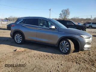 2019 Infiniti QX50 Essential with VIN 3PCAJ5M39KF117065, listed as a Copart auction lot 50702595 with 95,899 mi miles and Salvage title. Bid and sale history available at DreamBid. Image 4.