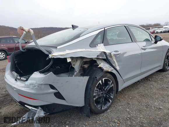 2024 Kia K5 GT-Line z VIN 5XXG64J22RG228095, wystawiony jako IAAI lot #41888510 z przebiegiem 11 927 mil mil oraz . Historia ofert i sprzedaży dostępna na DreamBid. Obrazek 18.