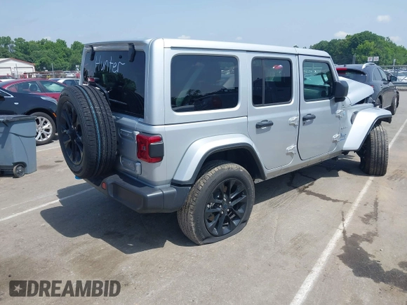 2024 Jeep Wrangler Sahara with VIN 1C4RJXP60RW292136, listed as a IAAI auction lot 42280063 with 26,701 mi miles and . Bid and sale history available at DreamBid. Image 4.