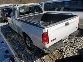 2000 Ford F-150 XL with VIN 1FTZX1727YNB23518, listed as a Copart auction lot 43914215 with 0 mi miles and Salvage Title. Bid and sale history available at carsss.com. Image 2.