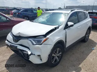 2017 Toyota RAV4 XLE with VIN JTMWFREV8HJ118885, listed as a IAAI auction lot 42097180 with 122,481 mi miles. Bid and sale history available at carsss.com. Image 20.