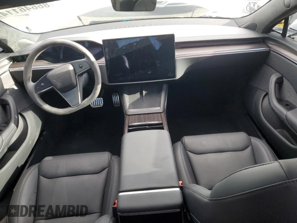 2024 Tesla Model S с VIN 5YJSA1E59RF541014, выставлен на аукционе Copart как лот 86646114 с пробегом 7 404 миль миль и Списание • Salvage title. История ставок и продаж доступна на DreamBid. Изображение 8.