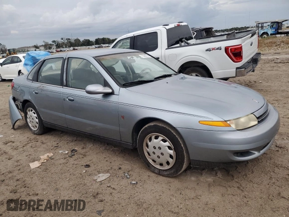 2002 Saturn LS z VIN 1G8JU54F82Y567169, wystawiony jako Copart lot #73280794 z przebiegiem 53 894 mil mil oraz Szkody całkowita. Historia ofert i sprzedaży dostępna na DreamBid. Obrazek 4.