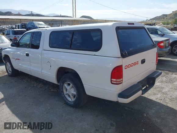 1999 Dodge Dakota with VIN 1B7FL22P0XS288012, listed as a IAAI auction lot 41695852 with 150,431 mi miles. Bid and sale history available at carsss.com. Image 3.