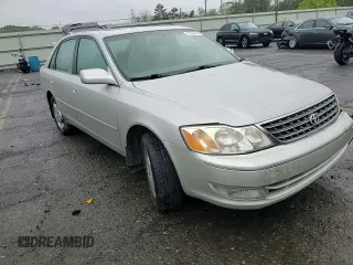 2004 Toyota Avalon XL z VIN 4T1BF28B94U380488, wystawiony jako Copart lot #57809445 z przebiegiem 103 078 mil mil oraz Szkoda całkowita • Salvage title. Historia ofert i sprzedaży dostępna na DreamBid. Obrazek 14.