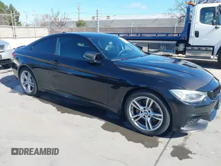 2015 BMW 4 Series 435i xDrive z VIN WBA3R5C59FK189457, wystawiony jako IAAI lot #41717989 z przebiegiem 116 402 mil mil oraz . Historia ofert i sprzedaży dostępna na DreamBid. Obrazek 1.