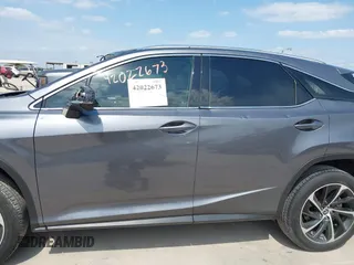 2019 Lexus RX 350 z VIN 2T2ZZMCA8KC149401, wystawiony jako IAAI lot #42022673 z przebiegiem 25 025 mil mil oraz . Historia ofert i sprzedaży dostępna na DreamBid. Obrazek 14.