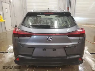 2021 Lexus UX with VIN JTHX9JBH8M2047296, listed as a Copart auction lot 87916535 with 10,297 mi miles and Salvage Title. Bid and sale history available at carsss.com. Image 6.