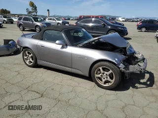 2003 Honda S2000 with VIN JHMAP11483T006461, listed as a Copart auction lot 52099995 with 187,376 mi miles and Salvage Title. Bid and sale history available at DreamBid. Image 4.