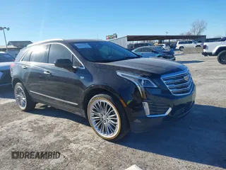 2017 Cadillac XT5 FWD with VIN 1GYKNARS3HZ122969, listed as a IAAI auction lot 41421230 with 116,603 mi miles. Bid and sale history available at carsss.com. Image 1.